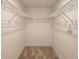 Walk-in closet with wire shelving, providing ample storage space at 6949 Crested Orchid Dr, Brooksville, FL 34602