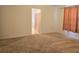Spacious bedroom with plush carpeting and an ensuite bathroom at 6949 Crested Orchid Dr, Brooksville, FL 34602