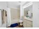 Bathroom featuring a shower/tub combination and wood-look flooring at 1442 Tiverton Dr, Brandon, FL 33511