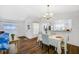 Inviting dining area with tile flooring, and a view into the bright kitchen at 1442 Tiverton Dr, Brandon, FL 33511