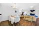 Cozy dining area with modern light fixture, flowing into a bright living space at 1442 Tiverton Dr, Brandon, FL 33511