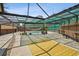 Relaxing screened-in pool area with a hammock at 2512 Ayers Hill Ct, Lutz, FL 33559