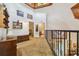 Upstairs hallway with access to bedrooms and bathroom at 2512 Ayers Hill Ct, Lutz, FL 33559