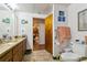 Bathroom with granite countertop, toilet and a view to another room at 2512 Ayers Hill Ct, Lutz, FL 33559