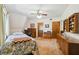 Bedroom featuring a twin bed, window, and wood cabinet at 2512 Ayers Hill Ct, Lutz, FL 33559