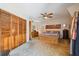Large bedroom with ceiling fan, built-in storage, and patio access at 2512 Ayers Hill Ct, Lutz, FL 33559