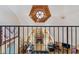 View of living room from the loft with high ceilings and a fireplace at 2512 Ayers Hill Ct, Lutz, FL 33559