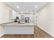 Modern kitchen with white cabinets and granite countertops at 1514 E 26Th Ave, Tampa, FL 33605