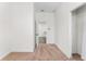 Bedroom with access to kitchen and neutral decor at 1514 E 26Th Ave, Tampa, FL 33605