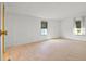 Spacious bedroom with wood flooring and large windows at 3931 Chris Dr, Wesley Chapel, FL 33543