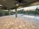 Spacious patio with pool and serene view at 156 Haddock Dr, Rotonda West, FL 33947