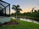 Peaceful canal view from the backyard at 156 Haddock Dr, Rotonda West, FL 33947