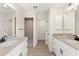 Double vanity bathroom with granite countertop and walk-in shower at 156 Haddock Dr, Rotonda West, FL 33947