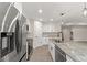 Modern kitchen with stainless steel appliances and granite countertops at 156 Haddock Dr, Rotonda West, FL 33947