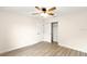 Well-lit bedroom with ceiling fan and walk-in closet at 156 Haddock Dr, Rotonda West, FL 33947