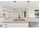 Kitchen island with granite countertop and modern sink at 156 Haddock Dr, Rotonda West, FL 33947