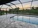 Enjoy sunset views from your poolside patio at 156 Haddock Dr, Rotonda West, FL 33947