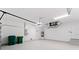 Spacious garage with overhead storage and extra space at 156 Haddock Dr, Rotonda West, FL 33947