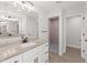 Double vanity bathroom with granite countertop and walk-in shower at 156 Haddock Dr, Rotonda West, FL 33947