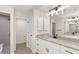 Double vanity bathroom with granite countertop and walk-in shower at 156 Haddock Dr, Rotonda West, FL 33947