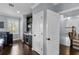 Sitting area with a bar, wood floors and bright lighting at 5002 W Homer Ave, Tampa, FL 33629