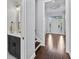 Elegant entryway with hardwood floors and view of staircase and living room at 5002 W Homer Ave, Tampa, FL 33629