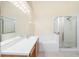 Bathroom boasts double sinks, a garden tub, and a shower at 11440 Misty Isle Ln, Riverview, FL 33579