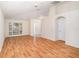 Bright living room featuring laminate floors and a ceiling fan at 11440 Misty Isle Ln, Riverview, FL 33579