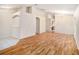 Spacious living room with laminate flooring and vaulted ceilings at 11440 Misty Isle Ln, Riverview, FL 33579