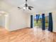 Living room with sliding glass doors leading to the backyard at 11440 Misty Isle Ln, Riverview, FL 33579