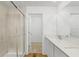 Modern bathroom with a large shower, white vanity, and quartz countertop at 13371 Drysdale Ave, Port Charlotte, FL 33981