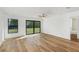 Bright bedroom with neutral walls and carpet, featuring a large window at 13371 Drysdale Ave, Port Charlotte, FL 33981