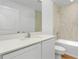 Clean bathroom with white cabinets and a bathtub at 4600 Kempson Ln, Port Charlotte, FL 33981