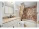 Updated bathroom with granite vanity, marble shower/tub combo, and tasteful decor at 2413 Bayshore Blvd # 2004, Tampa, FL 33629