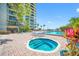 Relaxing hot tub located on a brick patio next to the pool at 2413 Bayshore Blvd # 2004, Tampa, FL 33629