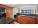 Kitchen with granite countertops and wood cabinets at 2413 Bayshore Blvd # 2004, Tampa, FL 33629