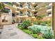 Lobby with a water feature and tropical landscaping at 2413 Bayshore Blvd # 2004, Tampa, FL 33629