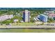 High-rise building near the water with lush landscaping at 2413 Bayshore Blvd # 2004, Tampa, FL 33629
