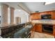 Kitchen features granite countertops, wood cabinets, and modern appliances at 2413 Bayshore Blvd # 2004, Tampa, FL 33629