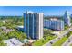 Aerial view of a high rise condo building, showcasing its modern architecture and surrounding landscape at 2413 Bayshore Blvd # 2004, Tampa, FL 33629