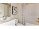 Clean bathroom with a bathtub and shower at 10571 Piedra Dr, Palmetto, FL 34221