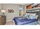 Cozy bedroom with a baseball-themed bedspread and ample closet space at 10575 Piedra Dr, Palmetto, FL 34221