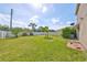 Large backyard with grassy lawn and privacy fence at 253 Cascade Bend Dr, Ruskin, FL 33570