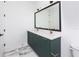 Modern bathroom with double vanity and marble-look floors at 1308 E Columbus Dr # 1, Tampa, FL 33605