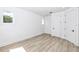 Bright bedroom with light wood floors and ample closet space at 1308 E Columbus Dr # 1, Tampa, FL 33605