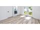 Spacious bedroom with wood floors and access to backyard at 1308 E Columbus Dr # 1, Tampa, FL 33605