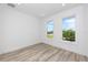 Bright bedroom with large windows and light wood flooring at 1308 E Columbus Dr # 1, Tampa, FL 33605