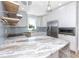 Modern kitchen with stunning granite countertop at 1308 E Columbus Dr # 1, Tampa, FL 33605