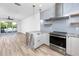 Modern kitchen with island and stainless steel appliances at 1308 E Columbus Dr # 1, Tampa, FL 33605