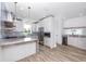 Modern kitchen with stainless steel appliances and island at 1308 E Columbus Dr # 1, Tampa, FL 33605